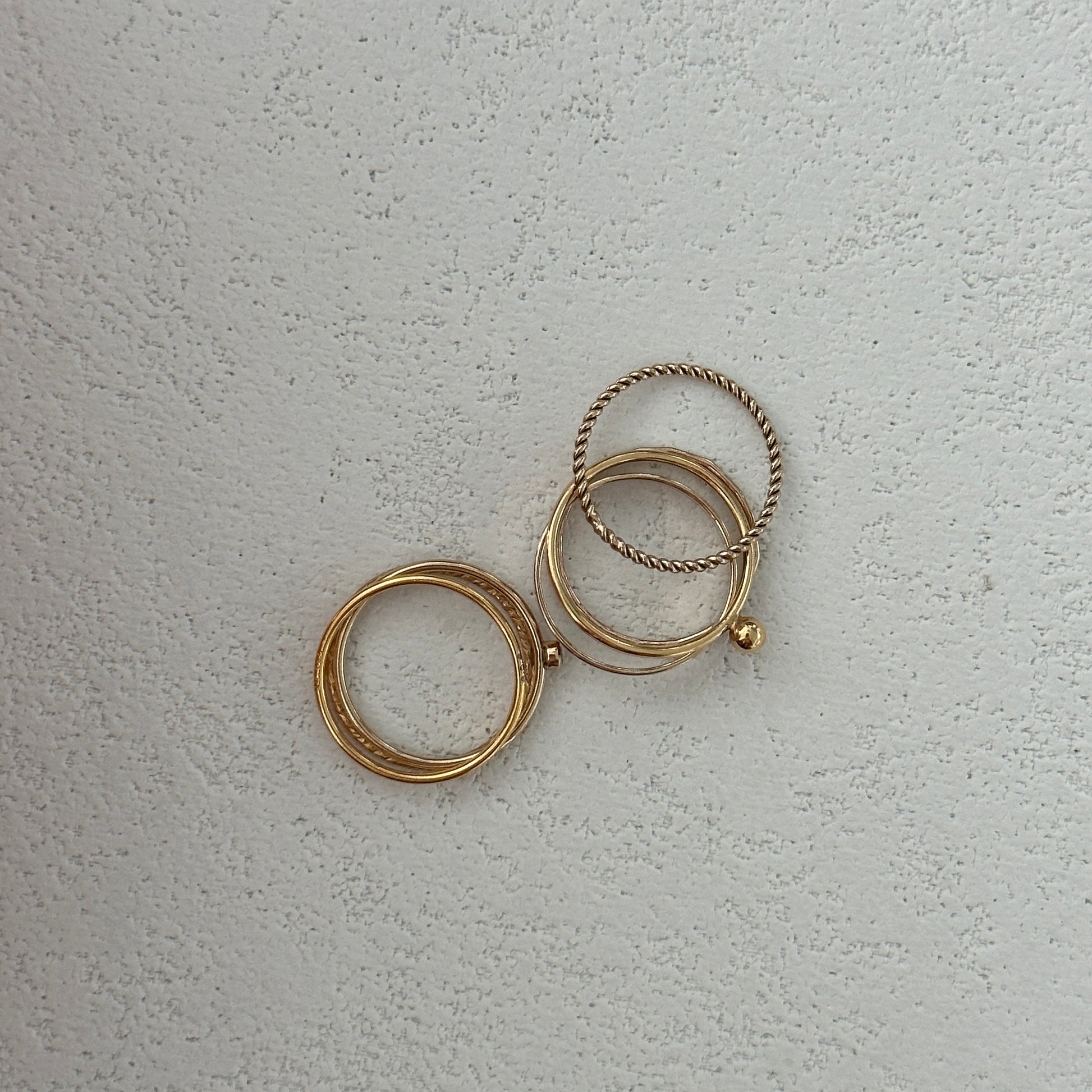 Close-up of gold stacking rings set